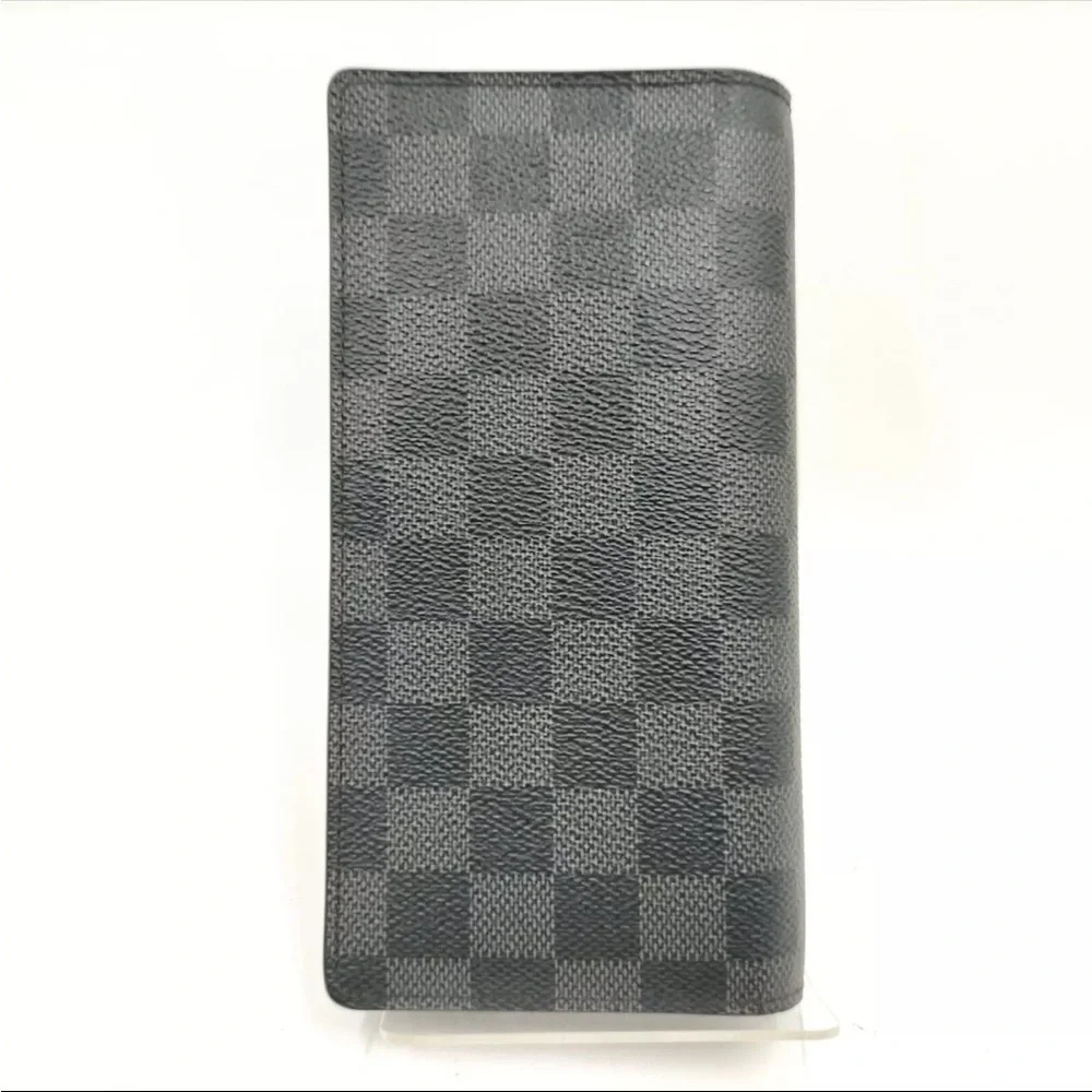 Louis Vuttton Damier Graphite wallet.